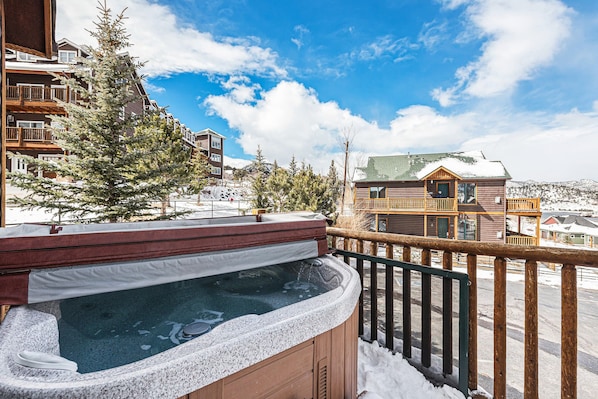 Enjoy the private hot tub on the units deck.