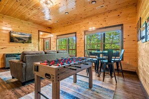 Foosball tournaments, card games, movie night. There is also a built-in electric fireplace (available October 1 - April 1)