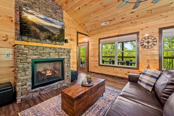 Large Smart TV with Gas Fireplace.