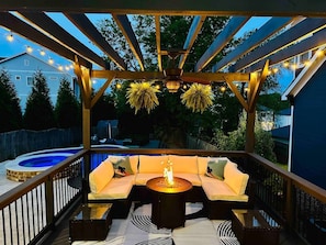 Sit on the patio off the kitchen and enjoy a glass of wine or cocktail while enjoying the fire and sound of the pool bubbling in the background. (Note: Quiet hours after 10pm.)