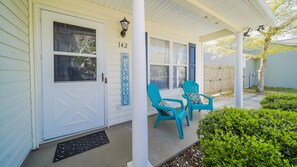 Enjoy a cup of coffee or a glass of wine on the quaint, front porch.