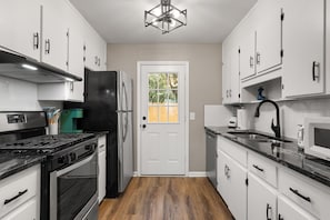 Updated Kitchen with Granite Counters and Stainless Appliances