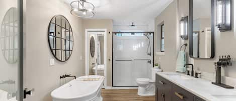 Full bath with double vanity, soaker tub and large shower