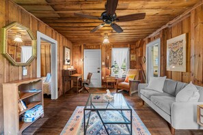 Living room, working area on the back right