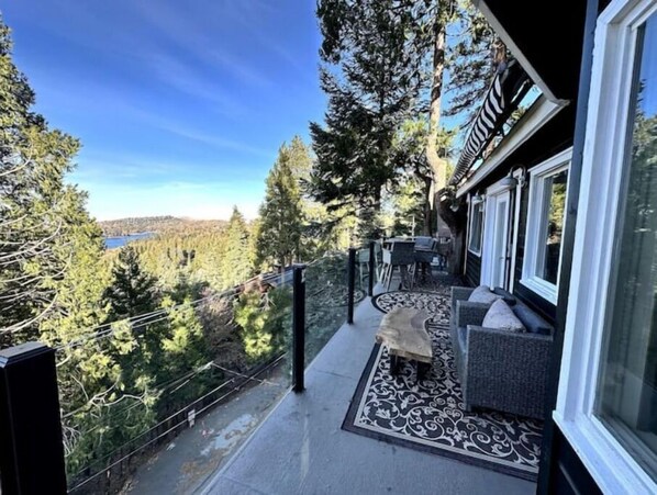 Front deck with expansive lake and mountain views