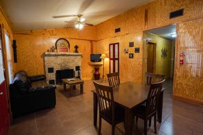 Living + dining area with fireplace