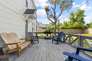 Grill on the back deck and relax in Adirondack chairs.