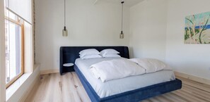 Comfy Blu Dot king bed adorned in eelo linens.