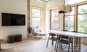 Bright corner Flat sits directly on Front + Union streets.