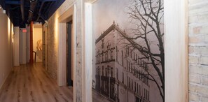 Hallway to enter the Flats with picture of the historic Masonic Building from 1890