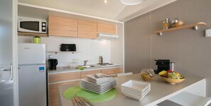Enjoy the perfect home-cooked meal in our modern and functional kitchenette.