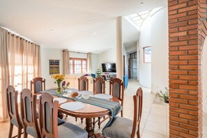 view from dining room to living area