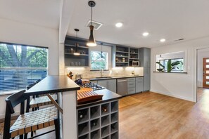 Sweet bar area with lots of wine storage