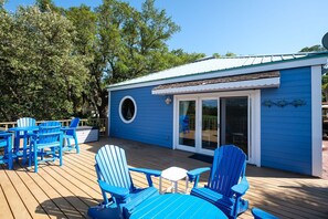 Plenty of outdoor seating at Blue Chair Key! Enjoy incredible water views while relaxing outside!