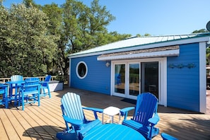 Plenty of outdoor seating at Blue Chair Key! Enjoy incredible water views while relaxing outside!