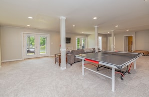 A ping pong table for the group to enjoy during leisure time.