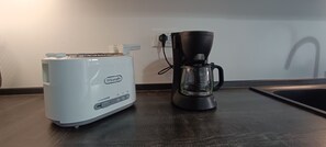 Kaffee und/oder Kaffeemaschine