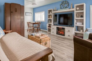 Living Room with a Flat-Screen TV