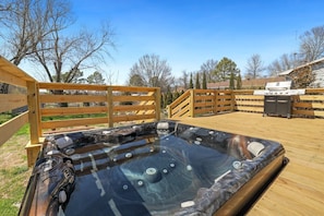 During your stay, enjoy amenities for 10, including a private HOT TUB!