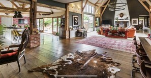 Main barn huge open plan sitting room dining room leading into kitchen 