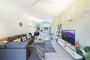 ZEN Westralia: 2-BR Cozy Inner-City Apt Near Shops - Step into our stylish living room, adorned with chic decor and comfortable seating for a memorable stay."