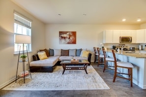 Living Room | 1st Floor | Smart TV | Electric Fireplace | Books