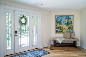 Beautiful front entry opens to the open floor plan of this home