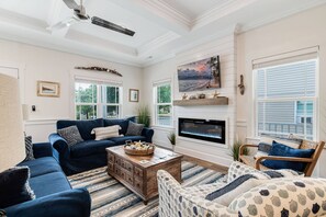 With the addition of the glass doors, with all these windows, this Living area feels so light & airy.