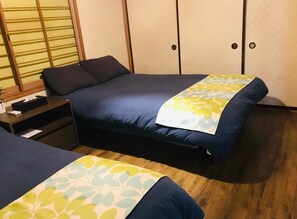 Room 1: 2 double beds