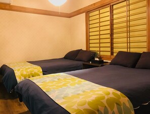 Room 1: 2 double beds