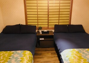 Room 1: 2 double beds