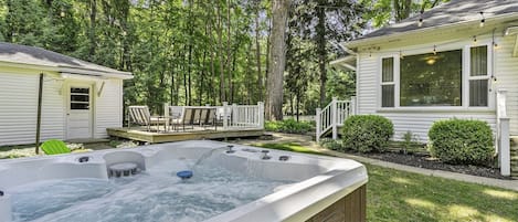 Private hot tub, yard, and deck area