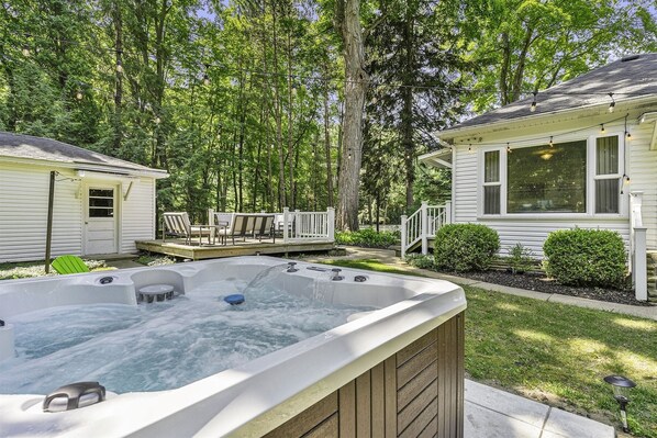 Private hot tub, yard, and deck area