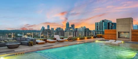 Rooftop pool with captivating skyline panorama.