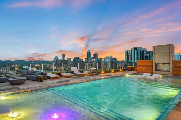 Rooftop pool with captivating skyline panorama.