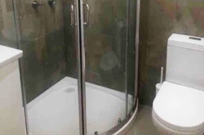 Bathroom with shower and toilet