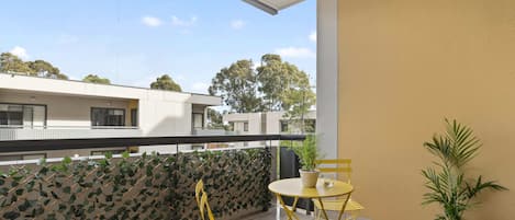 A balcony with a setting.