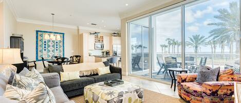 Enjoy great views of the pool and beach from the comfortable couches