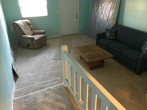 Floor, Flooring, Furniture, Indoors, Living Room