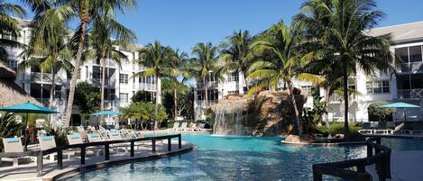 Beach Entry Resort Pool with Waterfall and Swim-around Island!