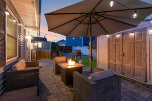 Enjoy a beautiful evening at the Jersey Shore sitting by the firepit with plenty of space and privacy for cozy moments at the Compound.