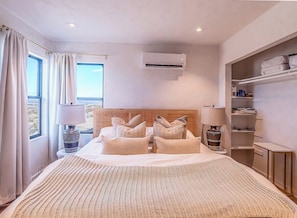 Unpack and unwind with our spacious closet, bench and luggage rack.