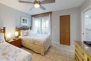 Two Queen Size Beds in the Guest Bedroom with its own Private Balcony and Direct Access to the Guest Bathroom