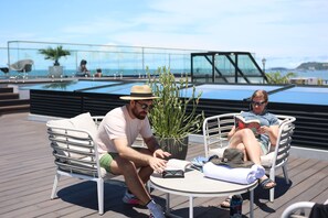 Enjoy the shared social area with rooftop pool during the best hours of the day 