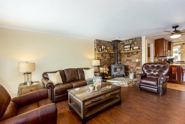 Welcome to Broken Bow Getaway, cozy up by the wood burning fireplace