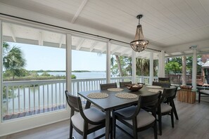 Beautifully decorated dining space with unbeatable water views!