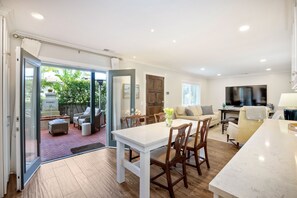 Open the doors onto the patio to the outdoor space