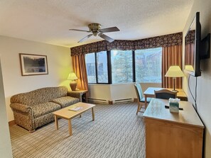 Living Room + Kitchenette + couch (not a pullout bed) | Listed with @BookTraverse