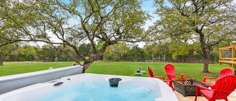 Relax under the stars in the hot tub