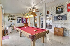 Fun game room with a pool table